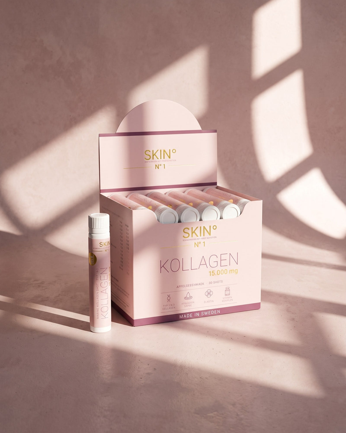 SKIN° Box und Ampulle im Sonnenlicht