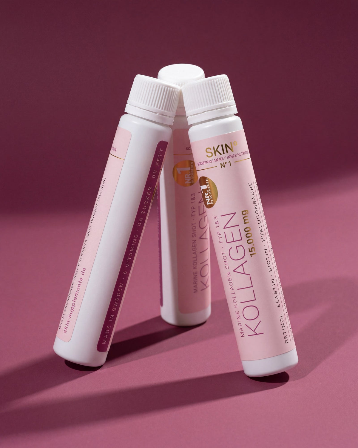 Zwei SKIN° Ampullen auf Plum